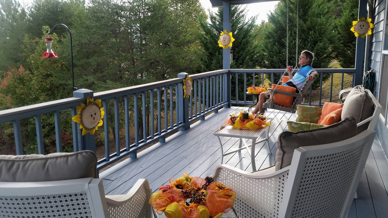  - Restore Roofing - Roofing Contractor in Hatfield, PA - Decks -  - man-enjoying-morning-view-in-mountains-while-enjoy-2025-02-15-16-52-14-utc